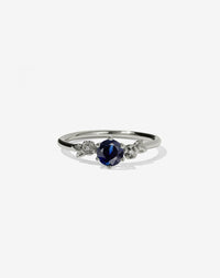 Floral Engagement Ring in white Gold with blue sapphire.