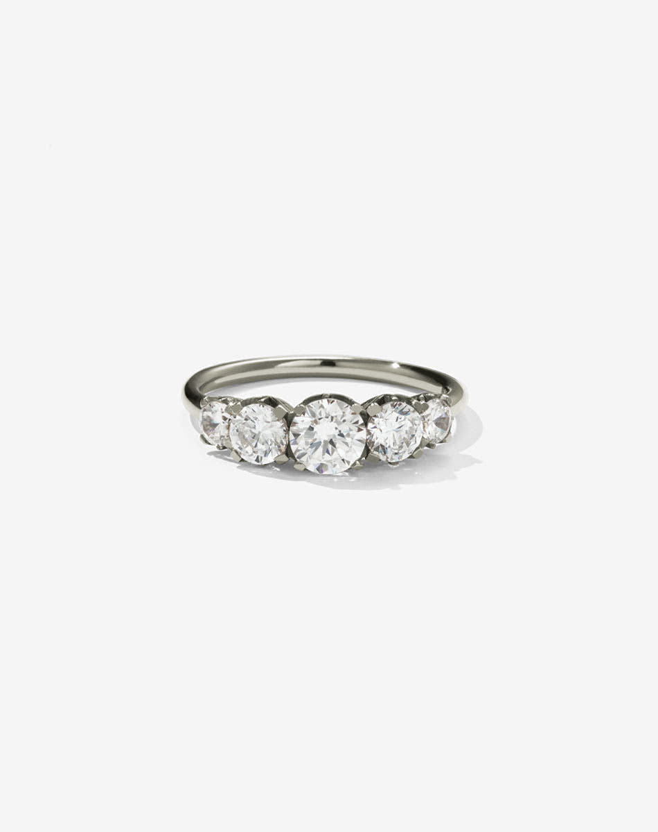 A classic white gold, five stone diamond engagement ring. Set with diamonds.