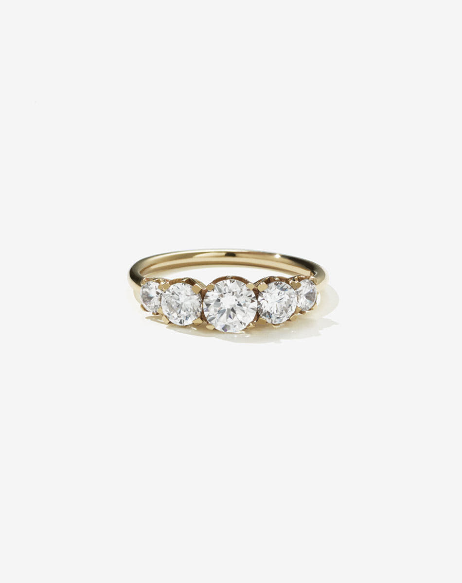 A classic yellow gold, five stone diamond engagement ring. Set with  diamonds.