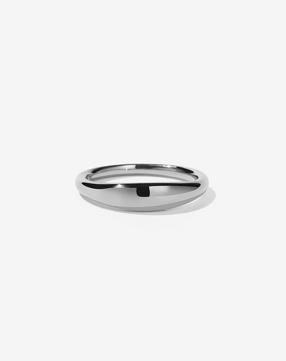 A simple and elegant sterling silver ring with a curved design