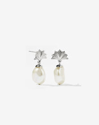 A pair of sterling silver drop earrings featuring a fan-shaped ginko leaf design atop a large freshwater pearl.