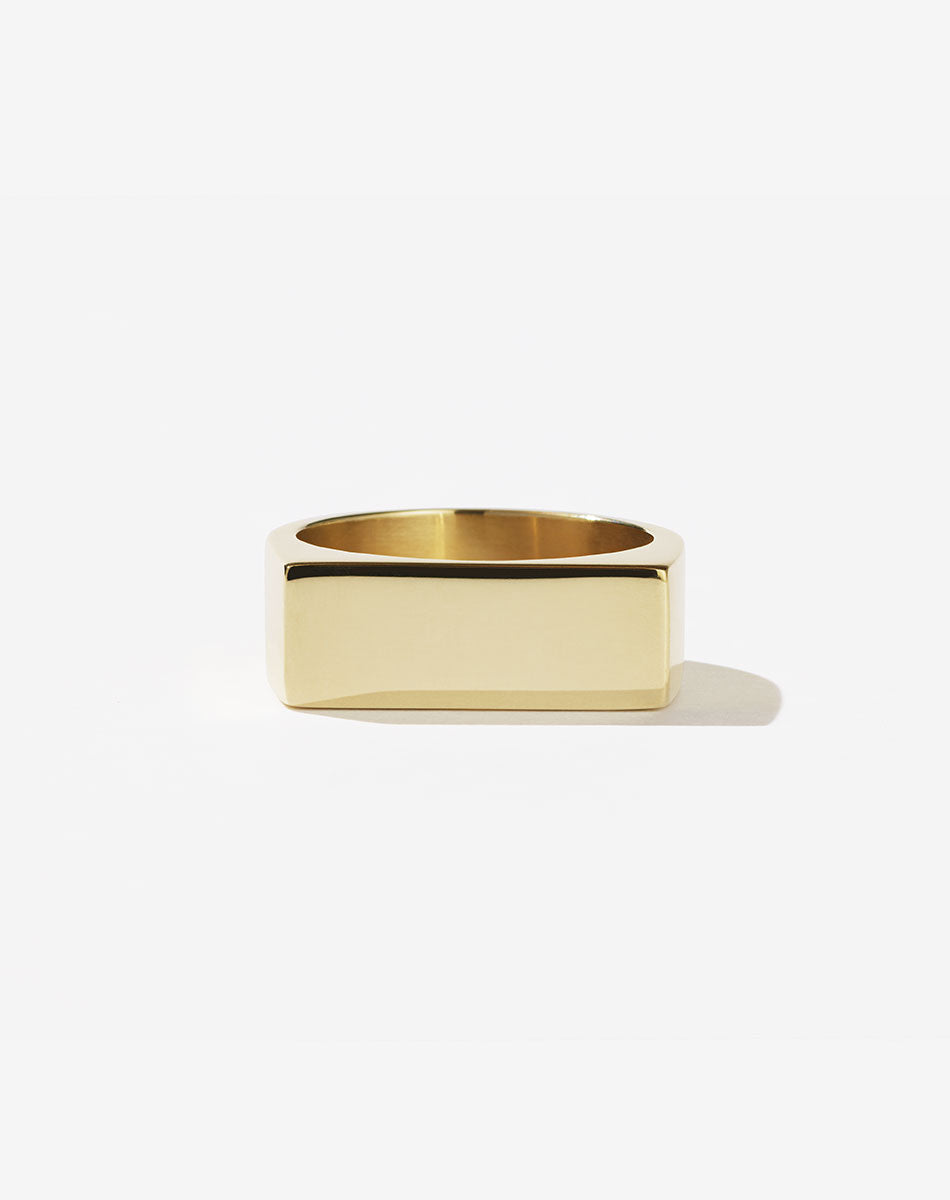 A rectangular signet ring in 9ct yellow gold, viewed from the front 