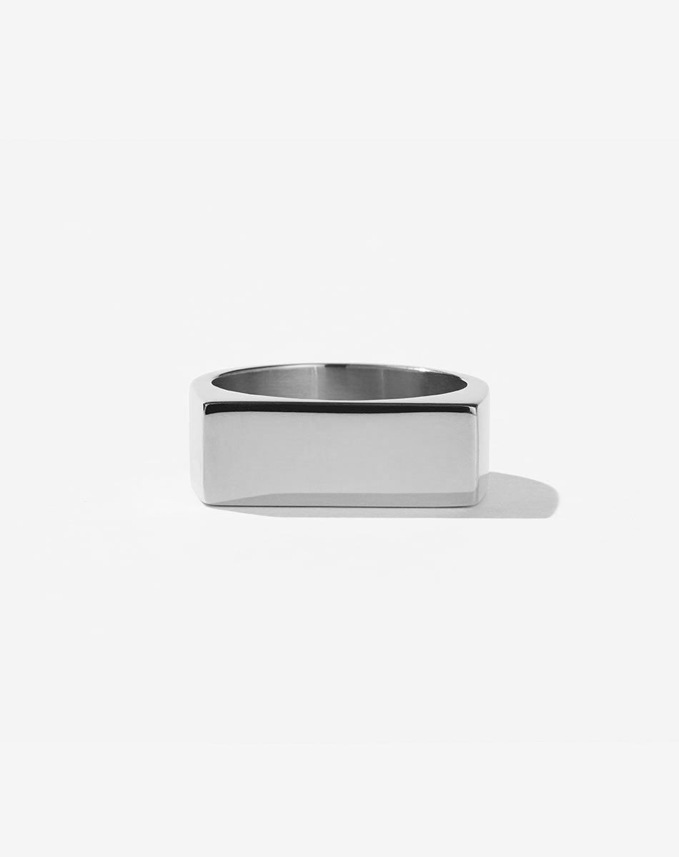 A simple rectangular signet ring made of sterling silver