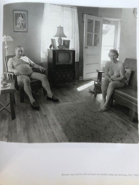 Retired man and his wife at home in a nudist camp one morning, New Jersey. Photograph by Diane Arbus.