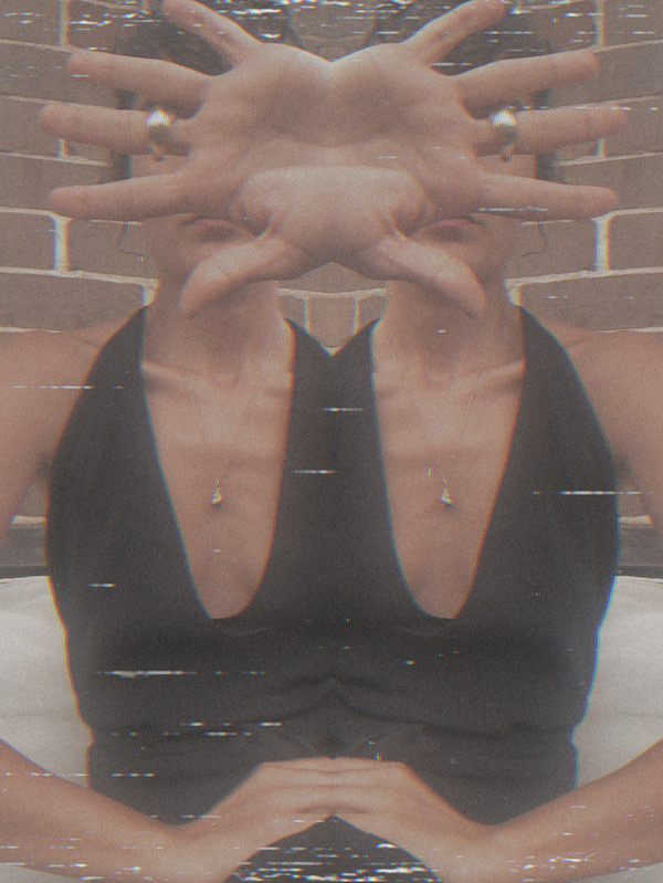 Ilkin wearing the Conch Charm Necklace.